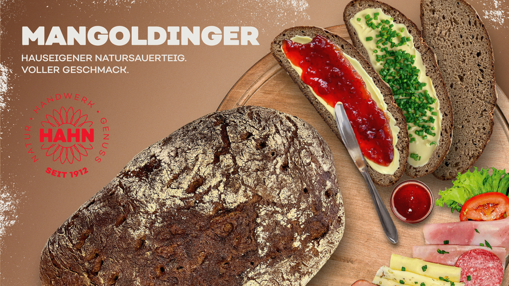 Aufgeschnittenes Brot mit Butter und Marmelade